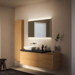 area lavabo- ONE lavabo da appoggio arrotondato, piano finitura lava, Acanto mobile lavabo, contenitore laterale sospeso e mobile colonna finitura rovere, Option Plus specchio