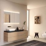 area lavabo- ONE lavabo da appoggio arrotondato, piano finitura lava, Acanto mobile lavabo, contenitore laterale sospeso e mobile colonna finitura rovere, Option Plus specchio