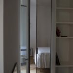 Eclisse porta a vetri per dare luce alla camera da letto