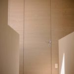 FerreroLegno porta exit zero custom made abbinata alla boiserie