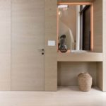FerreroLegno porta exit zero custom made abbinata alla boiserie