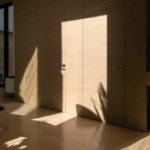 FerreroLegno porta exit zero custom made abbinata alla boiserie