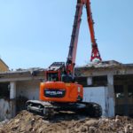 Develon Dx140Rdm-7 al lavoro