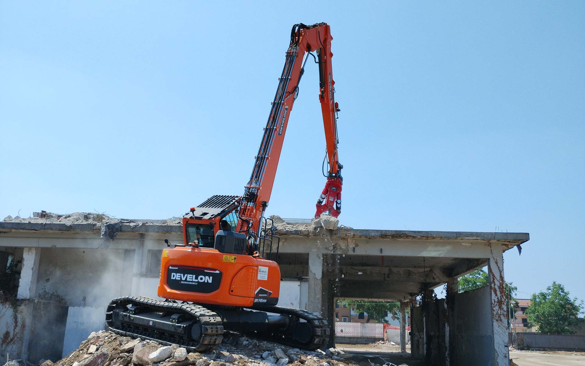 Develon Dx140Rdm-7 al lavoro
