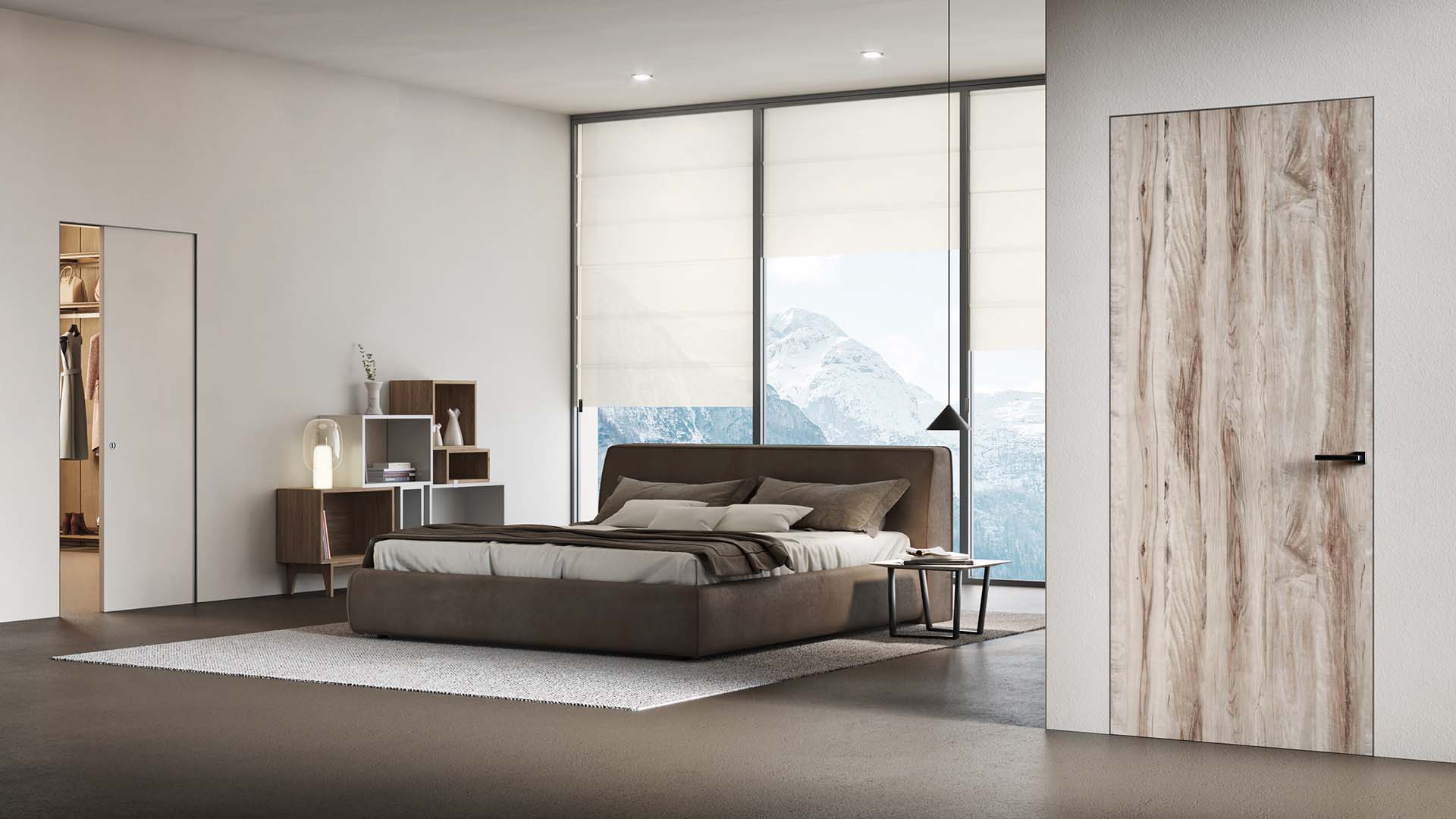 Dierre a sinistra porta scorrevole con cassonetto New Space Rasomuro e a destra porta interna di sicurezza silence