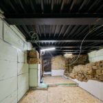 Realizzazione della copertura della cisterna romana mediante un solaio collaborante in cemento e acciaio, composto da travi Hea 400 e da una lamiera grecata