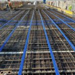 Progetto Cmr | Messa in opera delle armature del solaio realizzate con cavi di post tensione