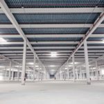 Realizzazione della struttura portante in acciaio e messa in opera delle lamiere grecate dei solai