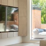 Eclisse zona giorno, parete con sportello semiaperto