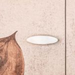 Eclisse Casa Colazione da Tiffany parete con porte a scomparsa particolare maniglia | ©Enrico Dal Zotto